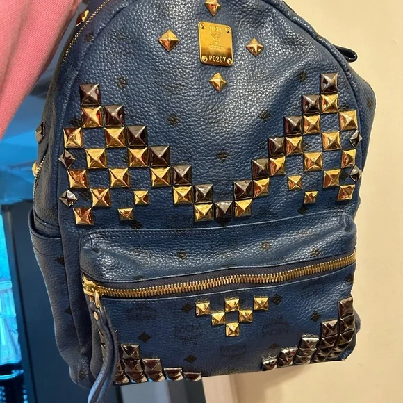 AUTHENTIC blue MCM Stark backpack with studs